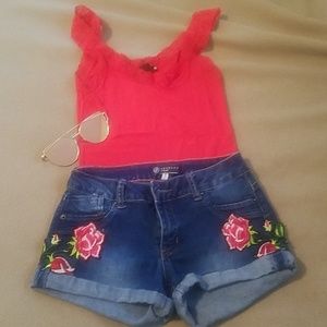 Kids denim shorts adorned in roses on either side⚘